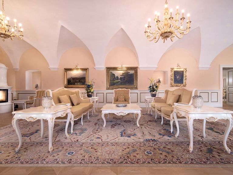 Living room of the Prandtauer Suite with imperialist paintings
